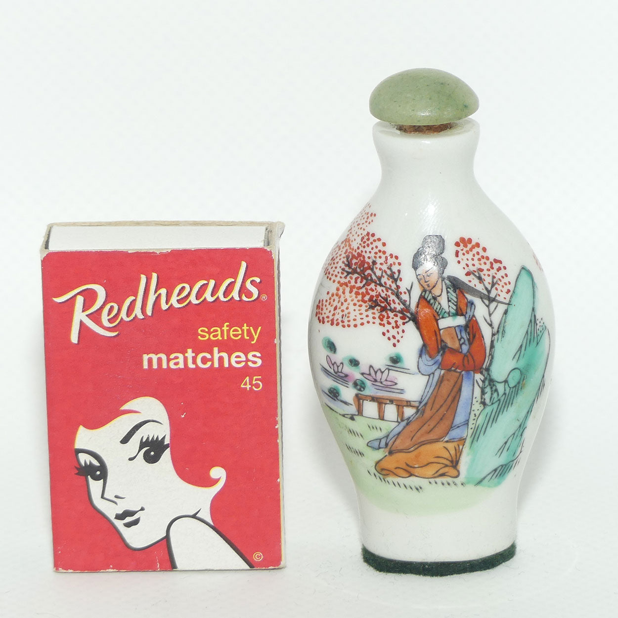 Chinese snuff bottle with greenstone stopper | Shy Maiden