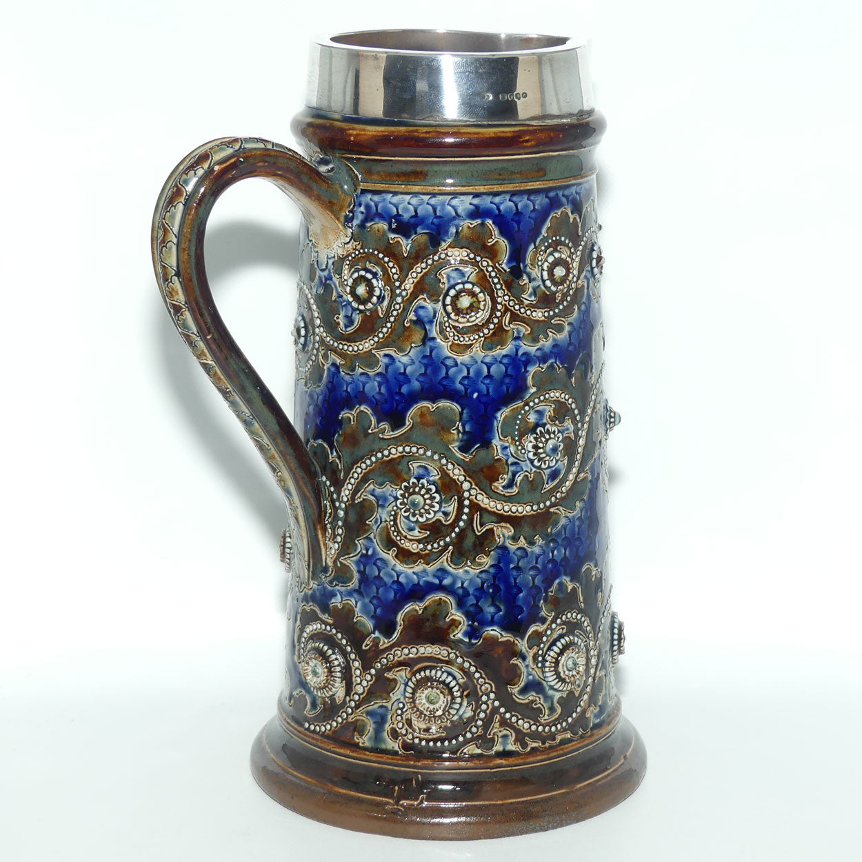 Doulton Lambeth George Tinworth stoneware ale jug with Sterling Silver rim (London 1876)