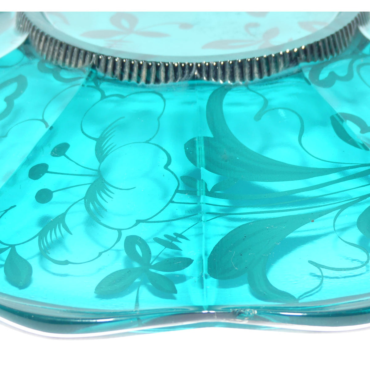 Turquoise Glass display plate overlaid with Painted Silver