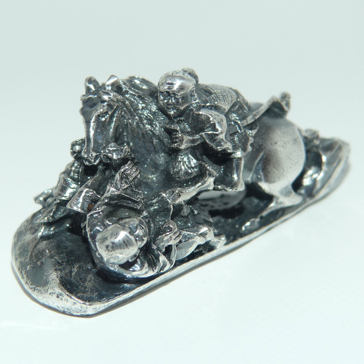 Japanese Meiji period Cast Silver Netsuke | Samurai on Horseback in Battle