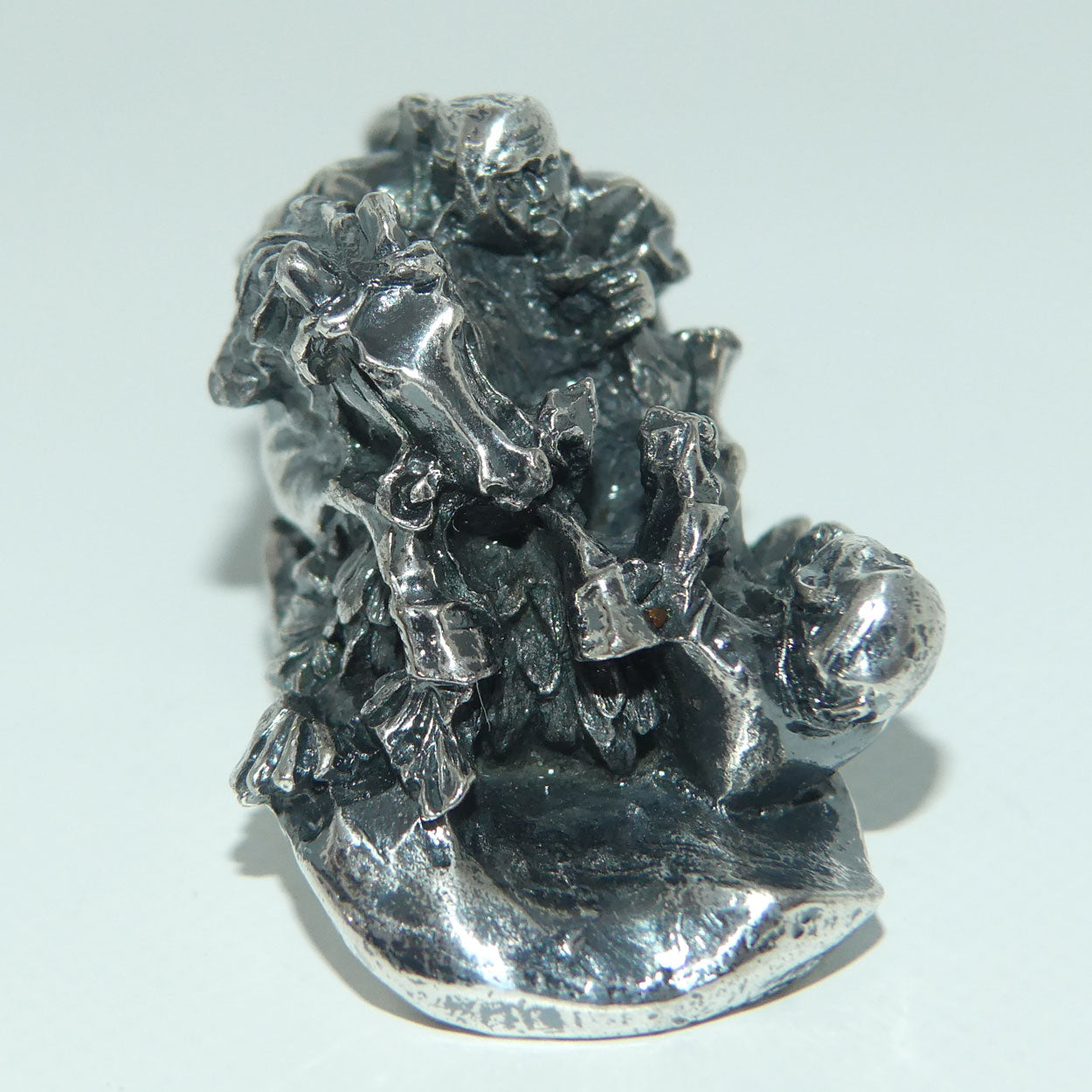 Japanese Meiji period Cast Silver Netsuke | Samurai on Horseback in Battle