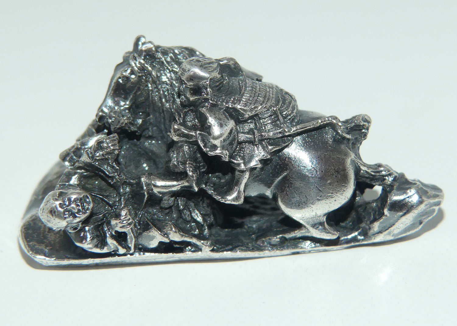 Japanese Meiji period Cast Silver Netsuke | Samurai on Horseback in Battle