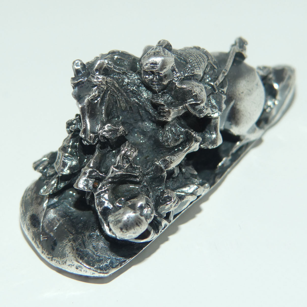 Japanese Meiji period Cast Silver Netsuke | Samurai on Horseback in Battle