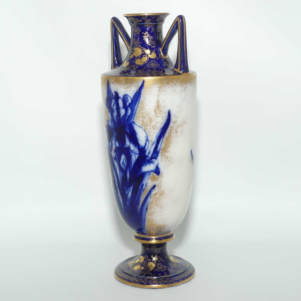 Doulton Burslem Blue Iris and Daffodil tall slender vase with twin handles and gilt highlights