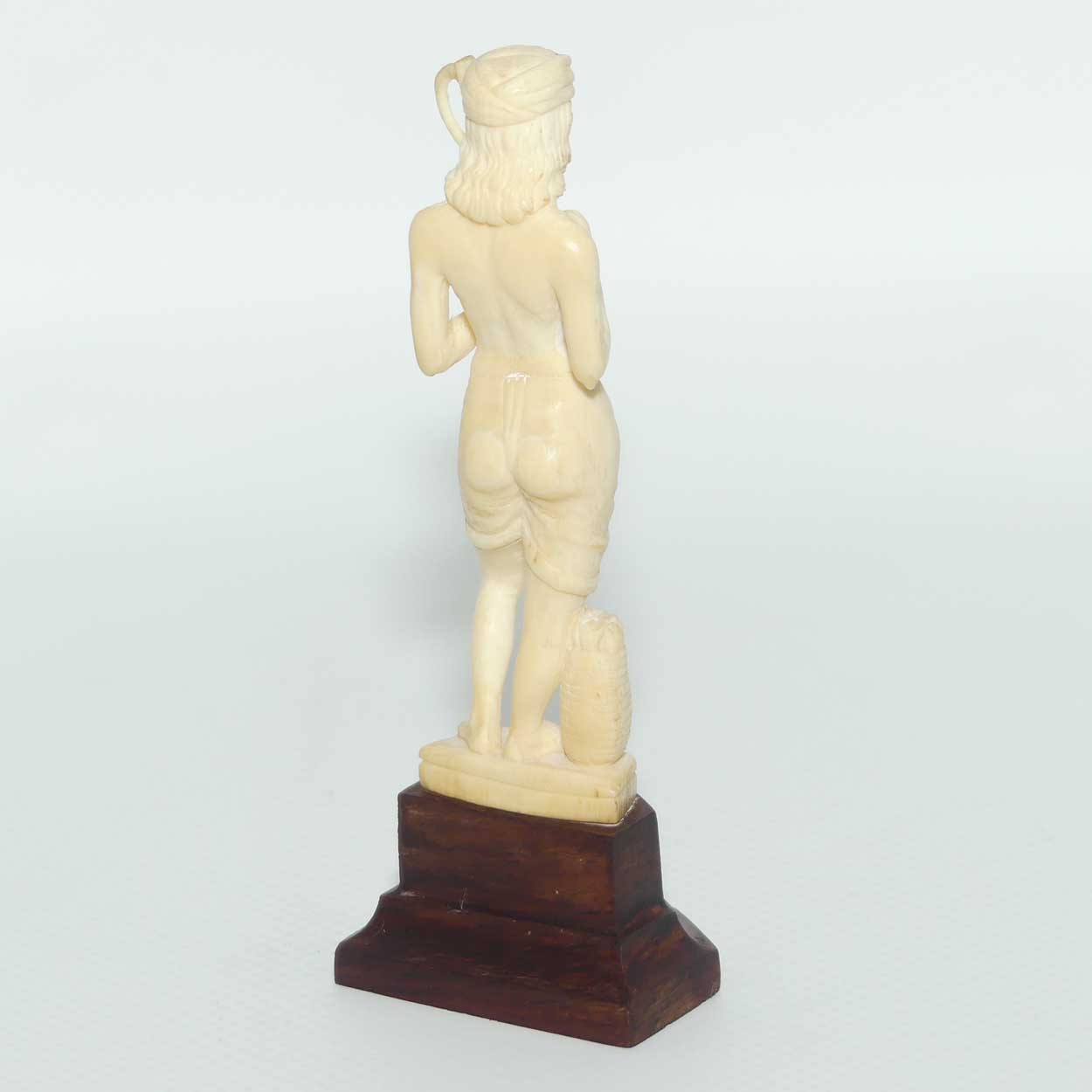 Carved Ivory Figure on Rosewood base | Fisherman | 10.5cm