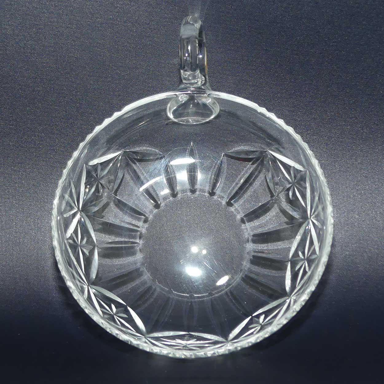 Finely cut single handled crystal server