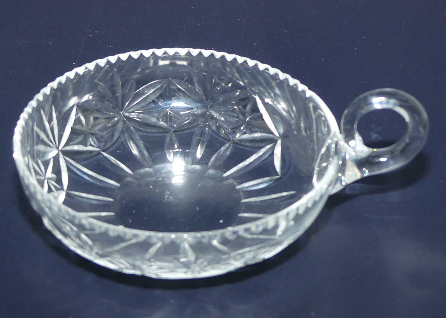 Finely cut single handled crystal server