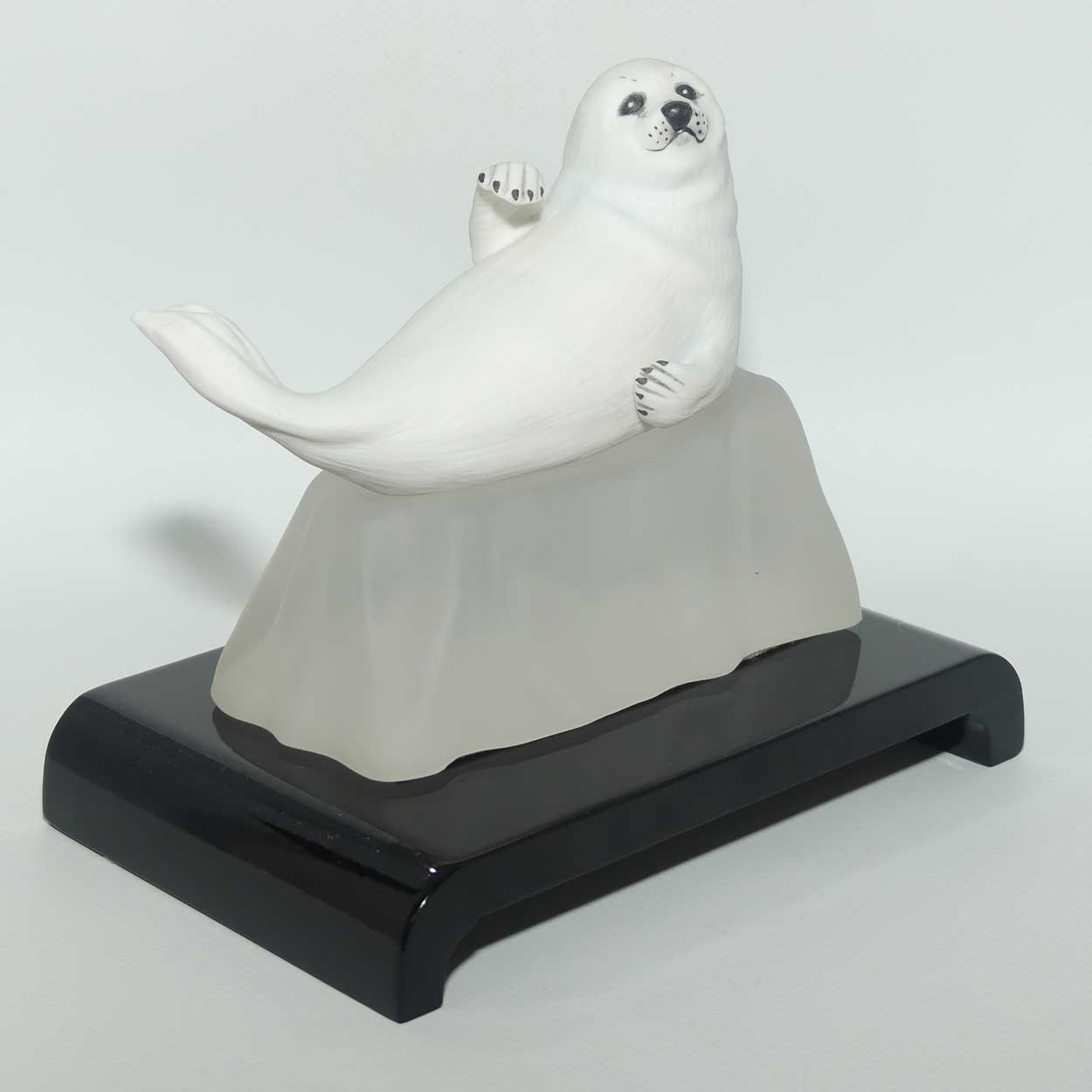 Franklin Mint | Snow Pup figure on base and plinth | Humane Society