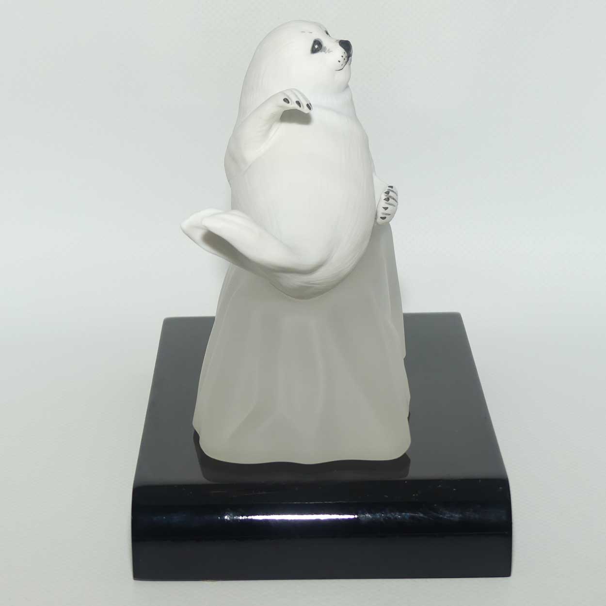 Franklin Mint | Snow Pup figure on base and plinth | Humane Society