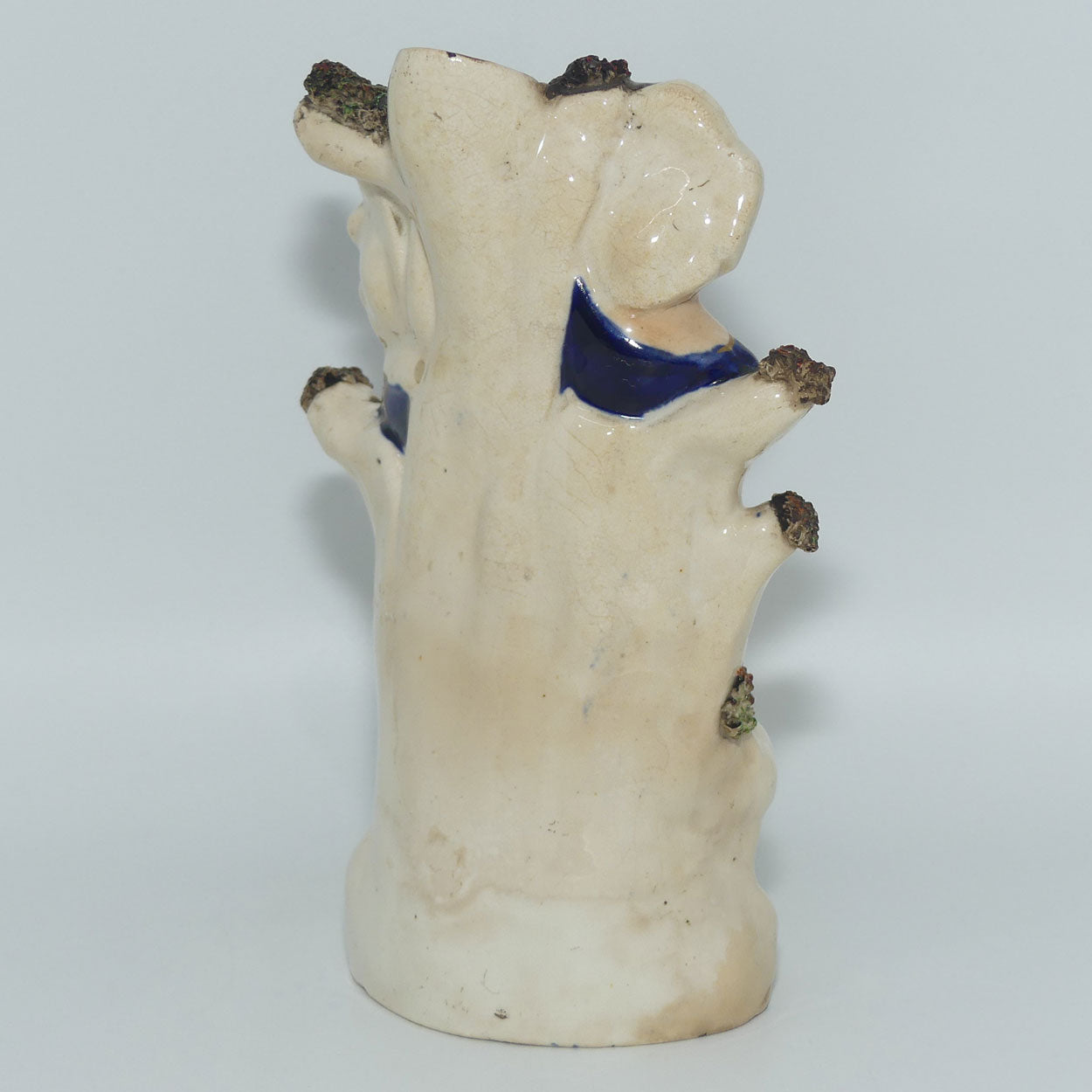 antique-staffordshire-figural-vase-couple-nursing-dogs-c-1860