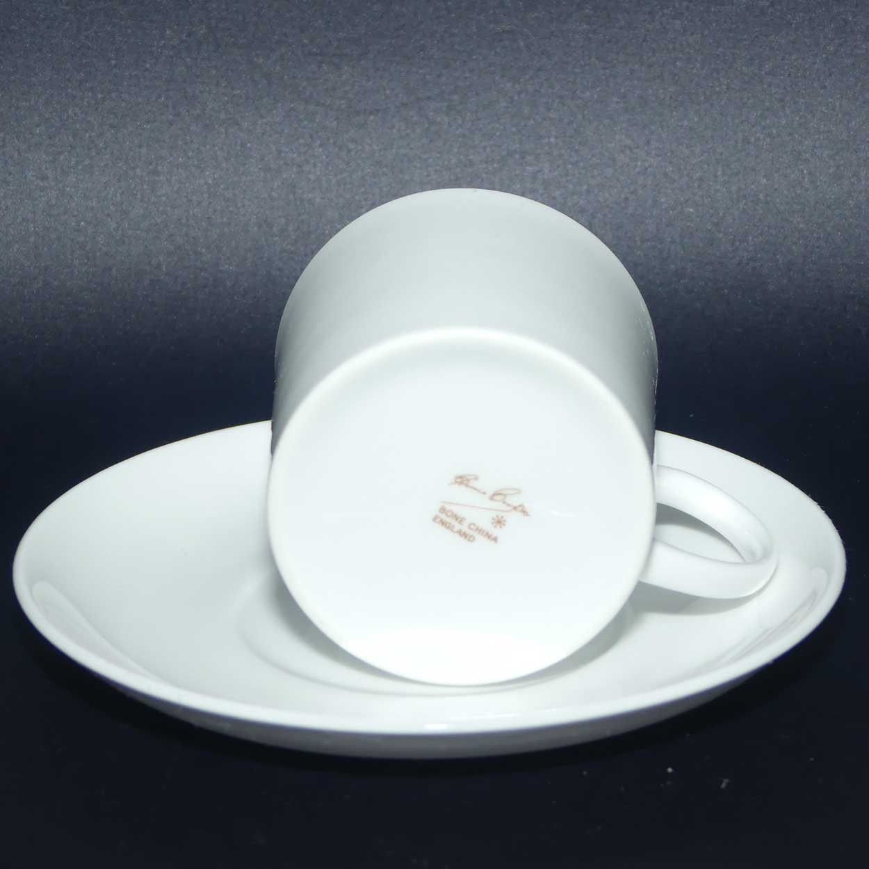 Susie Cooper coffee can and saucer | Greyish Sky Blue Interior and White