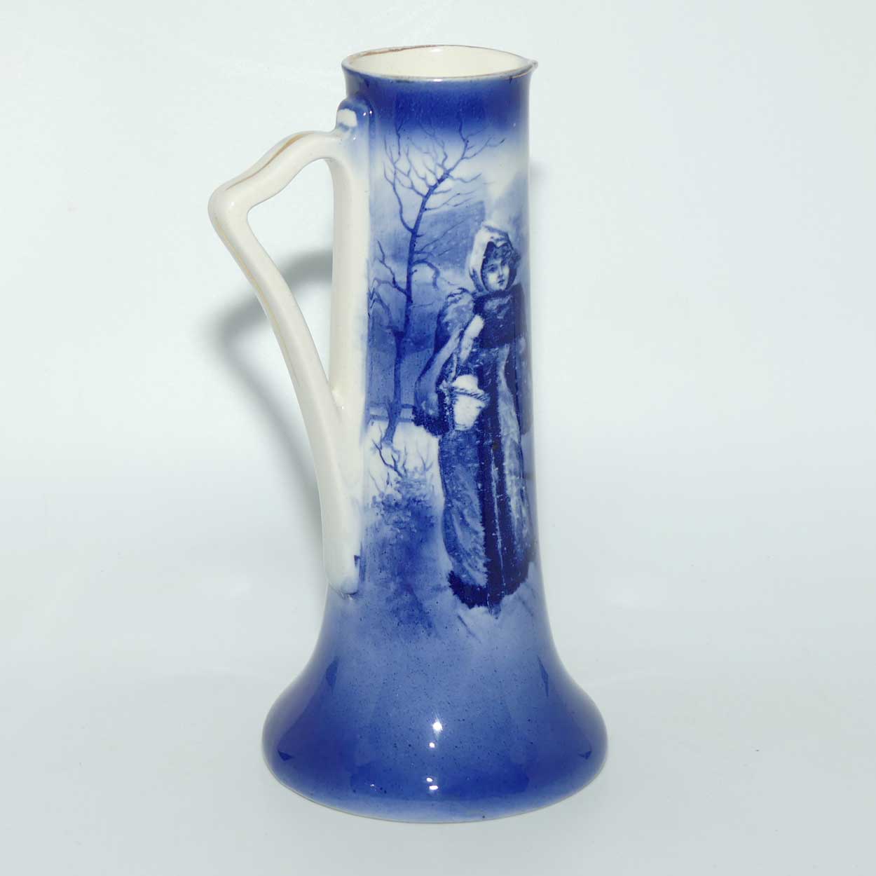 Royal Doulton Blue Children tall jug (Woman in Snowstorm)