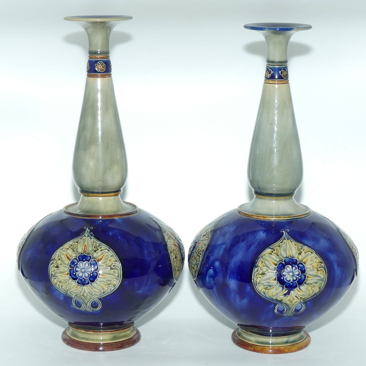 Royal Doulton stoneware pair of tall bulbous vases with applied floral rosettes