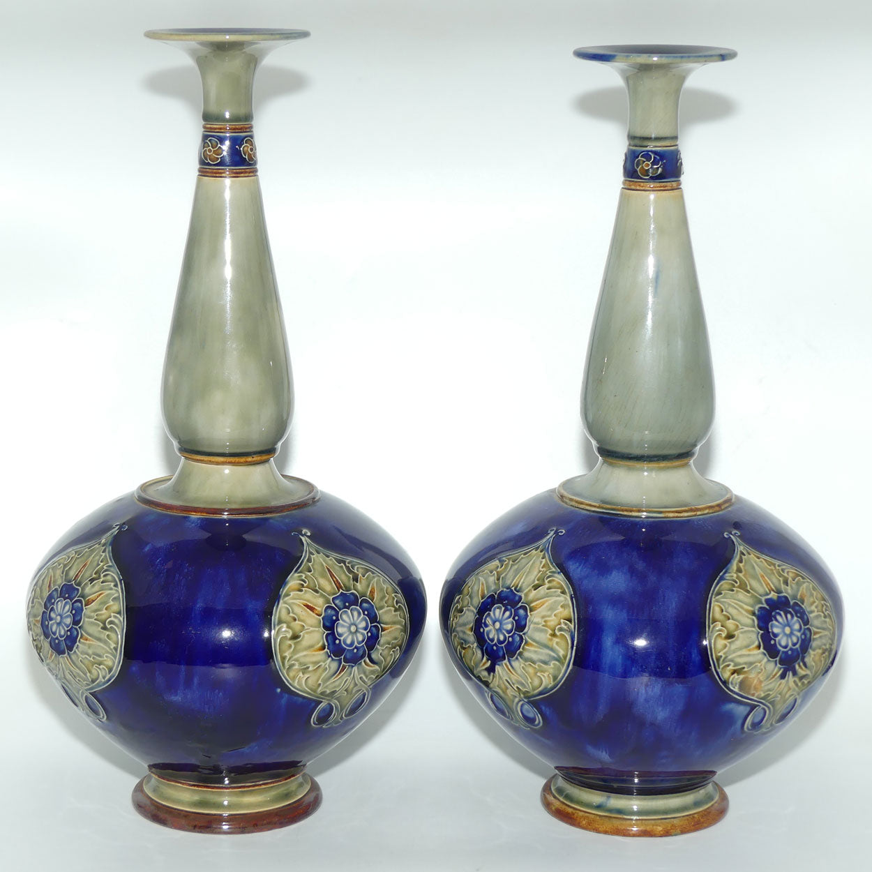 Royal Doulton stoneware pair of tall bulbous vases with applied floral rosettes