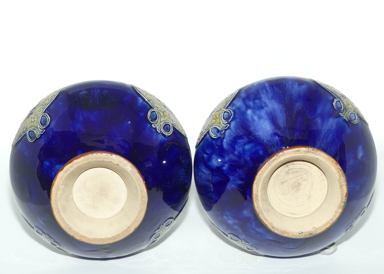 Royal Doulton stoneware pair of tall bulbous vases with applied floral rosettes