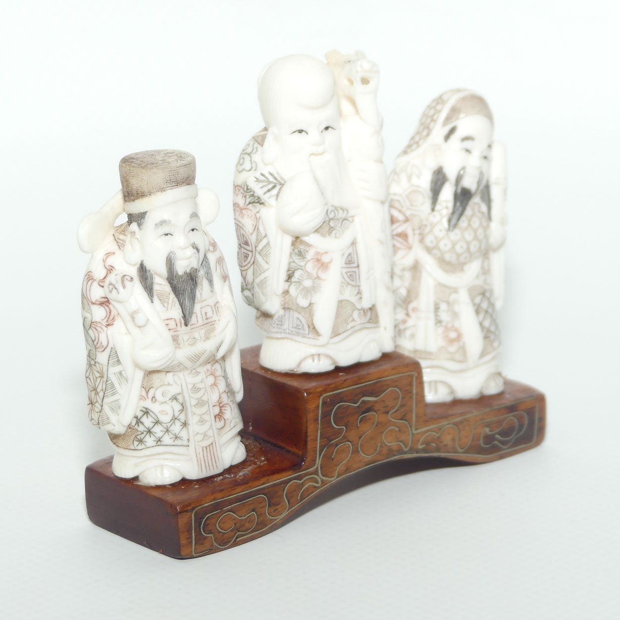 Japanese Carved Ivory Okimono figure on wooden base | Three Dieties | Meiji period | signed