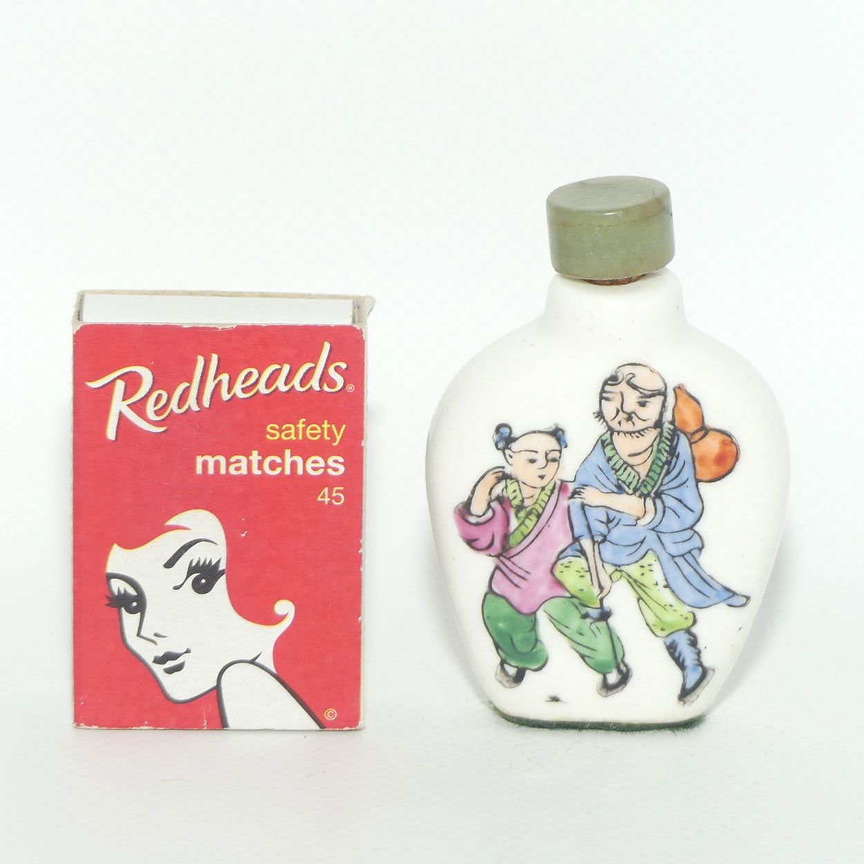 Chinese snuff bottle with greenstone stopper | Three Leg Race