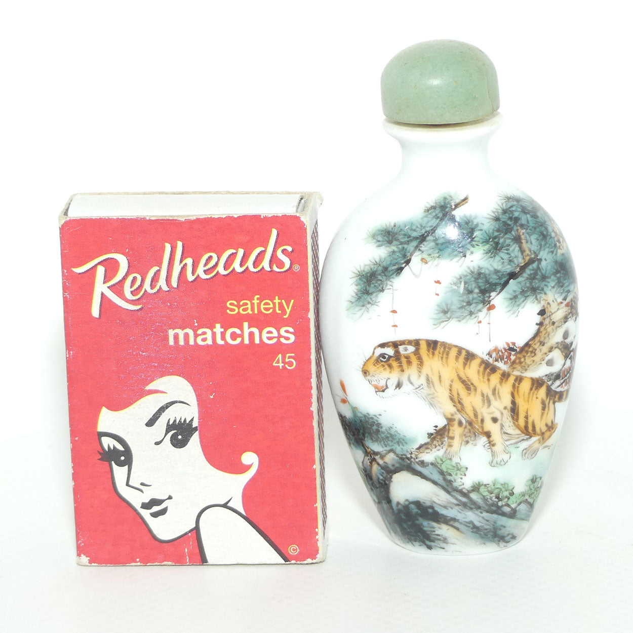Chinese Snuff bottle | Oval | Tiger on Cliff | Green stopper