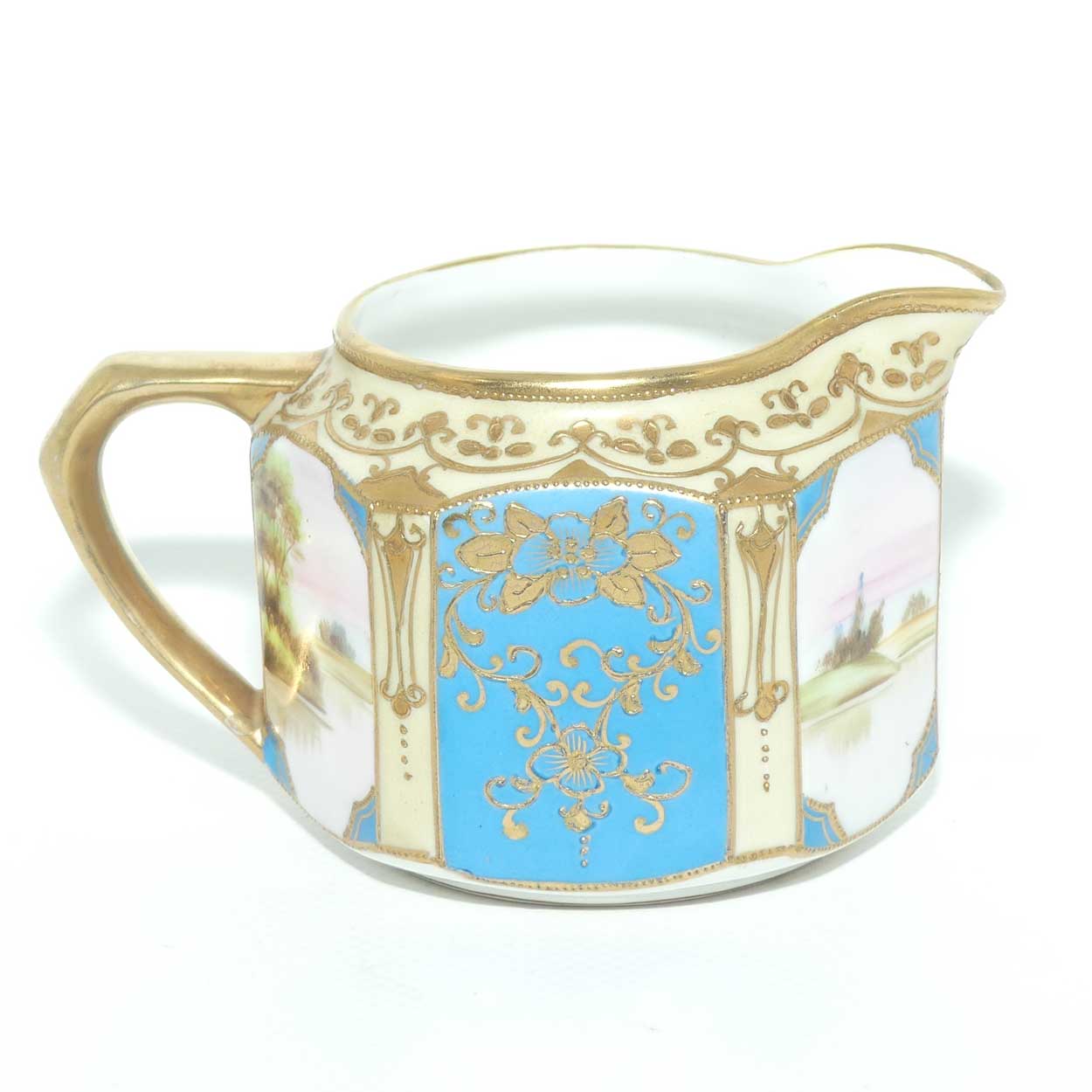 early Noritake Hand Painted and Gilt decorated Blue ground milk and sugar | Hexagonal shape | Lake Scene