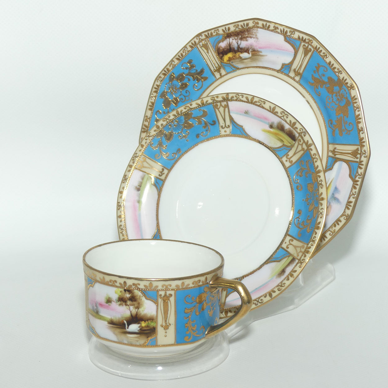 Early Noritake Hand Painted and Gilt decorated Blue ground tea trio | #1 | Lake Scene