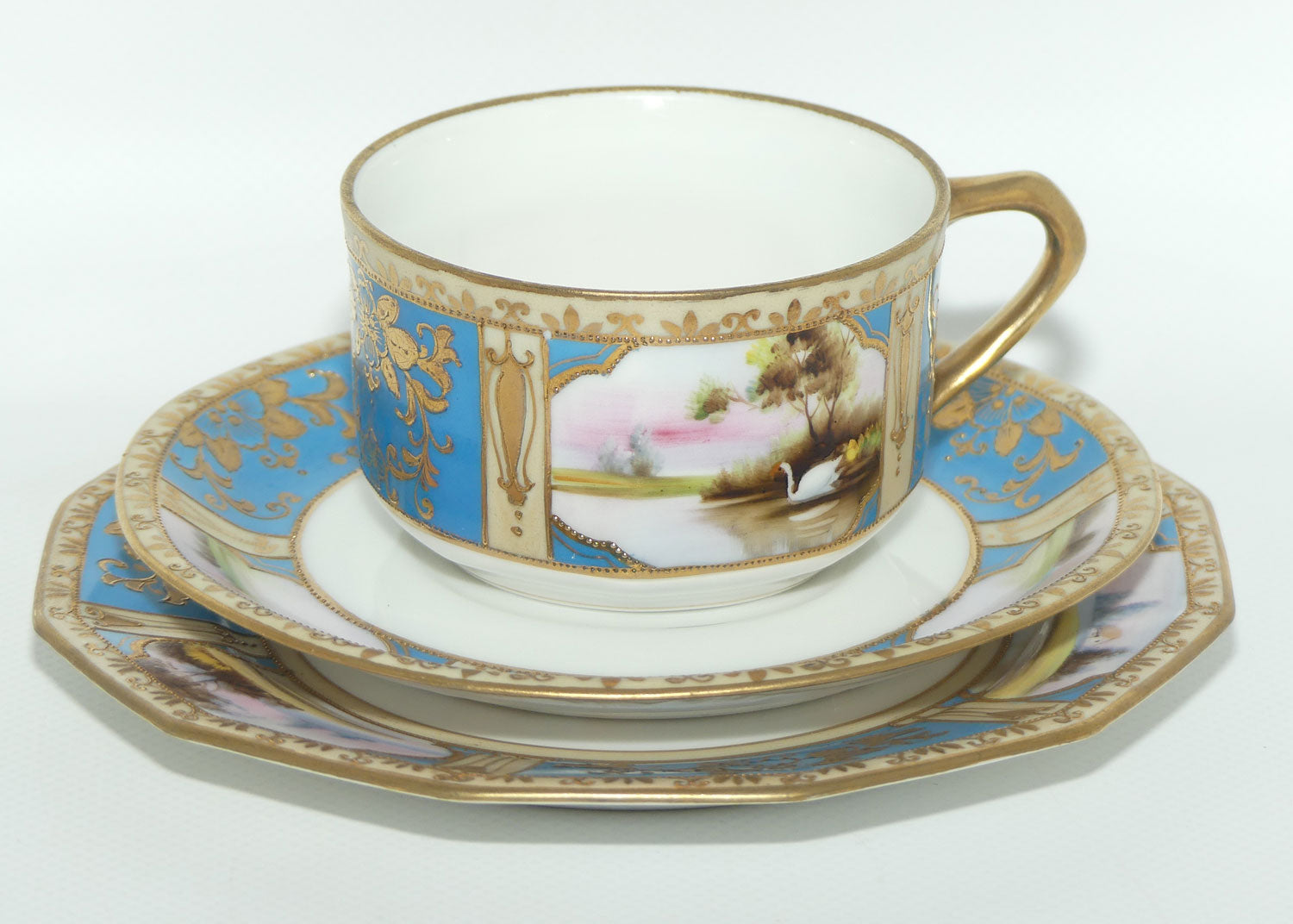 Early Noritake Hand Painted and Gilt decorated Blue ground tea trio | #1 | Lake Scene