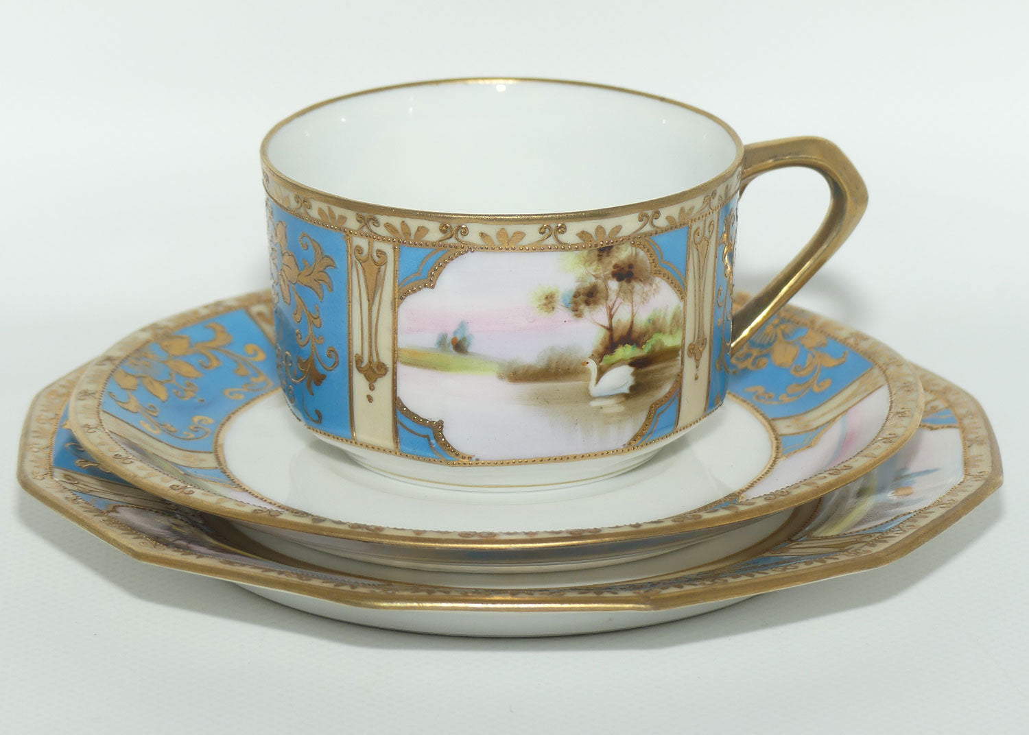 Early Noritake Hand Painted and Gilt decorated Blue ground tea trio | #2 | Lake Scene