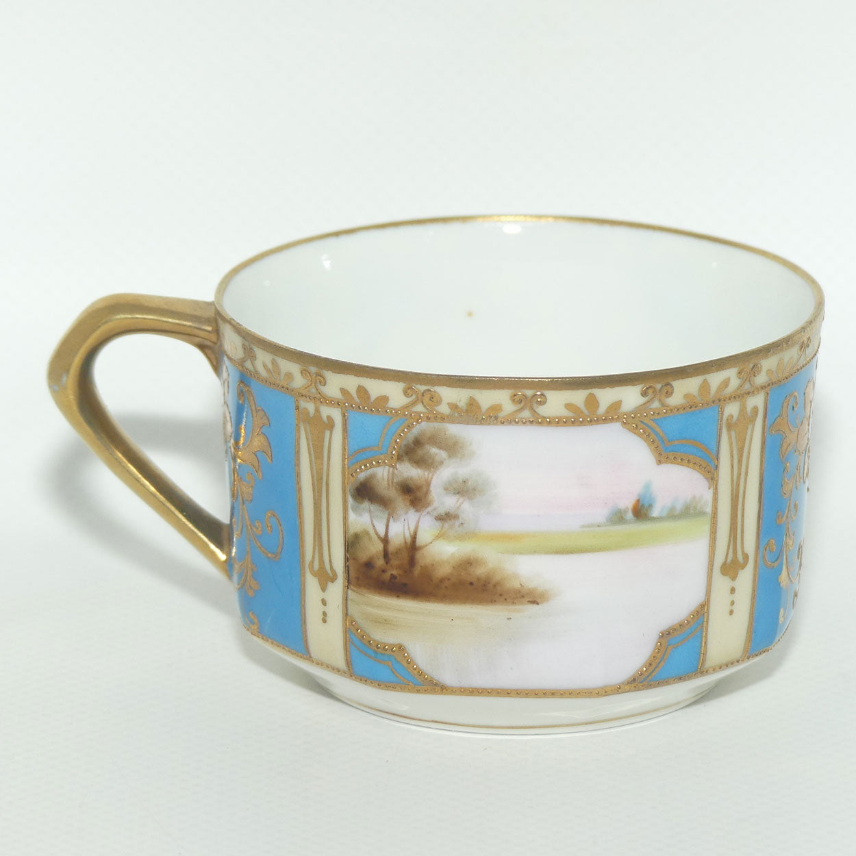 Early Noritake Hand Painted and Gilt decorated Blue ground tea trio | #2 | Lake Scene
