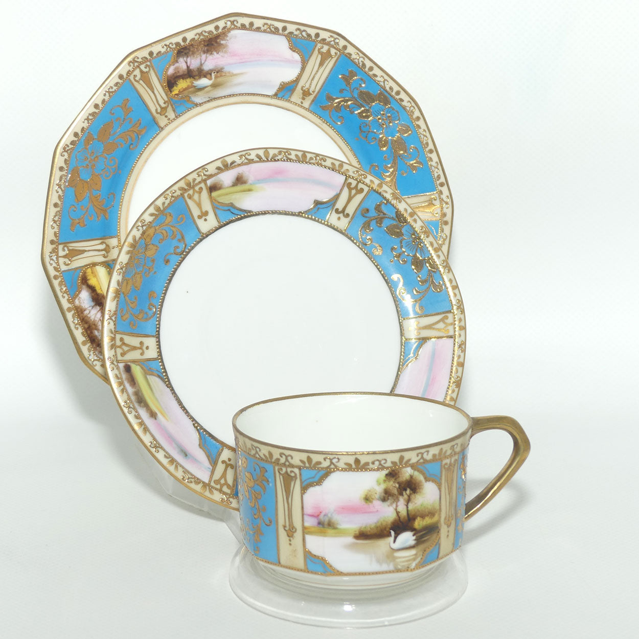 Early Noritake Hand Painted and Gilt decorated Blue ground tea trio | #3 | Lake Scene