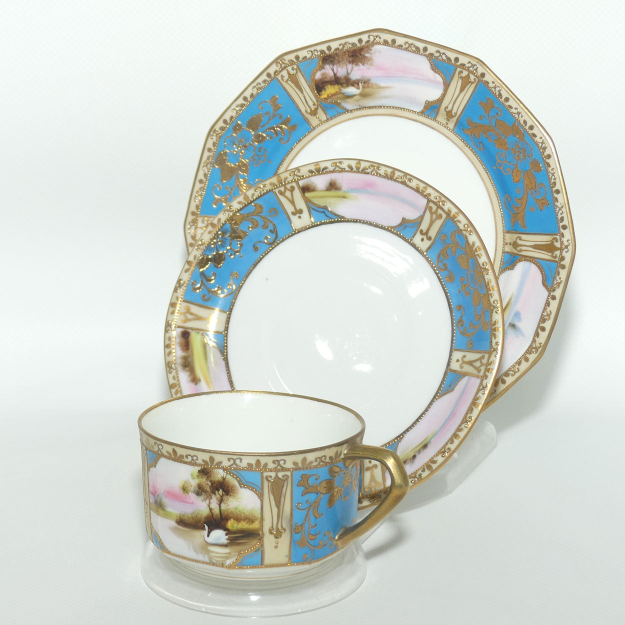 Early Noritake Hand Painted and Gilt decorated Blue ground tea trio | #3 | Lake Scene