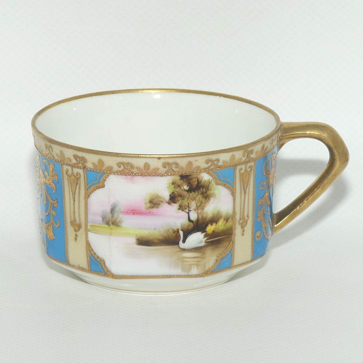 Early Noritake Hand Painted and Gilt decorated Blue ground tea trio | #4 | Lake Scene