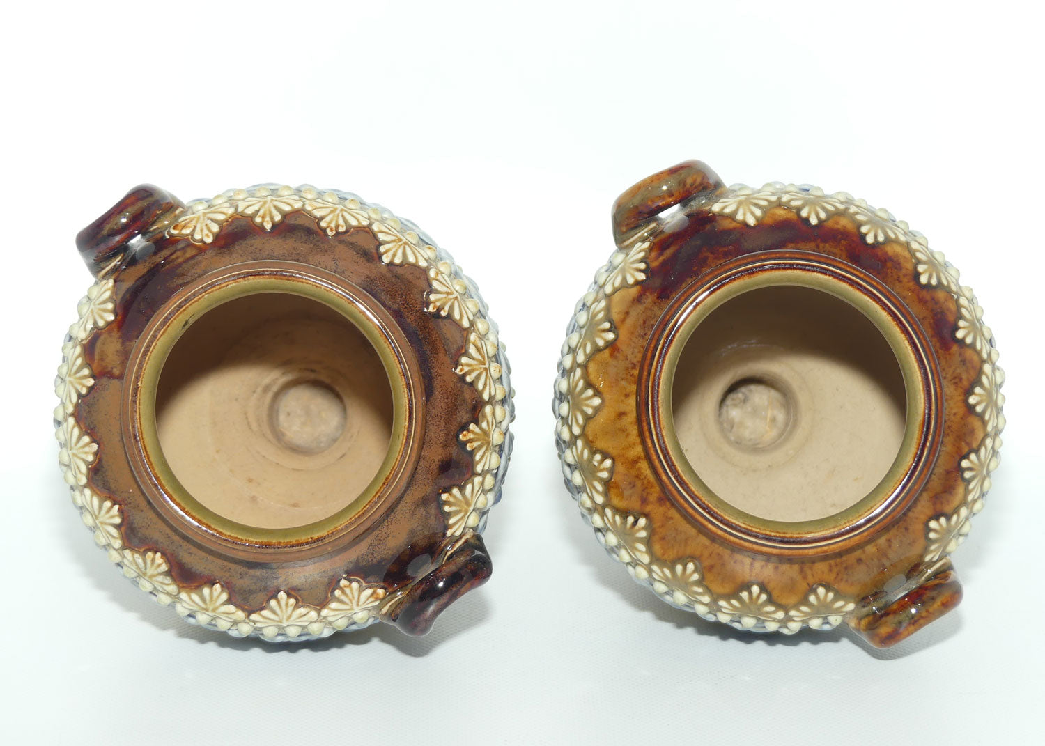 Doulton Lambeth stoneware pair of handled and footed urns (#4505)