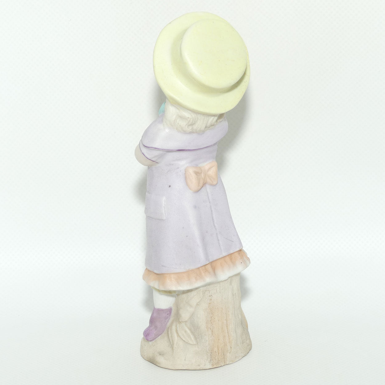 Victorian era Bisque figure of a Girl in Yellow Bonnet