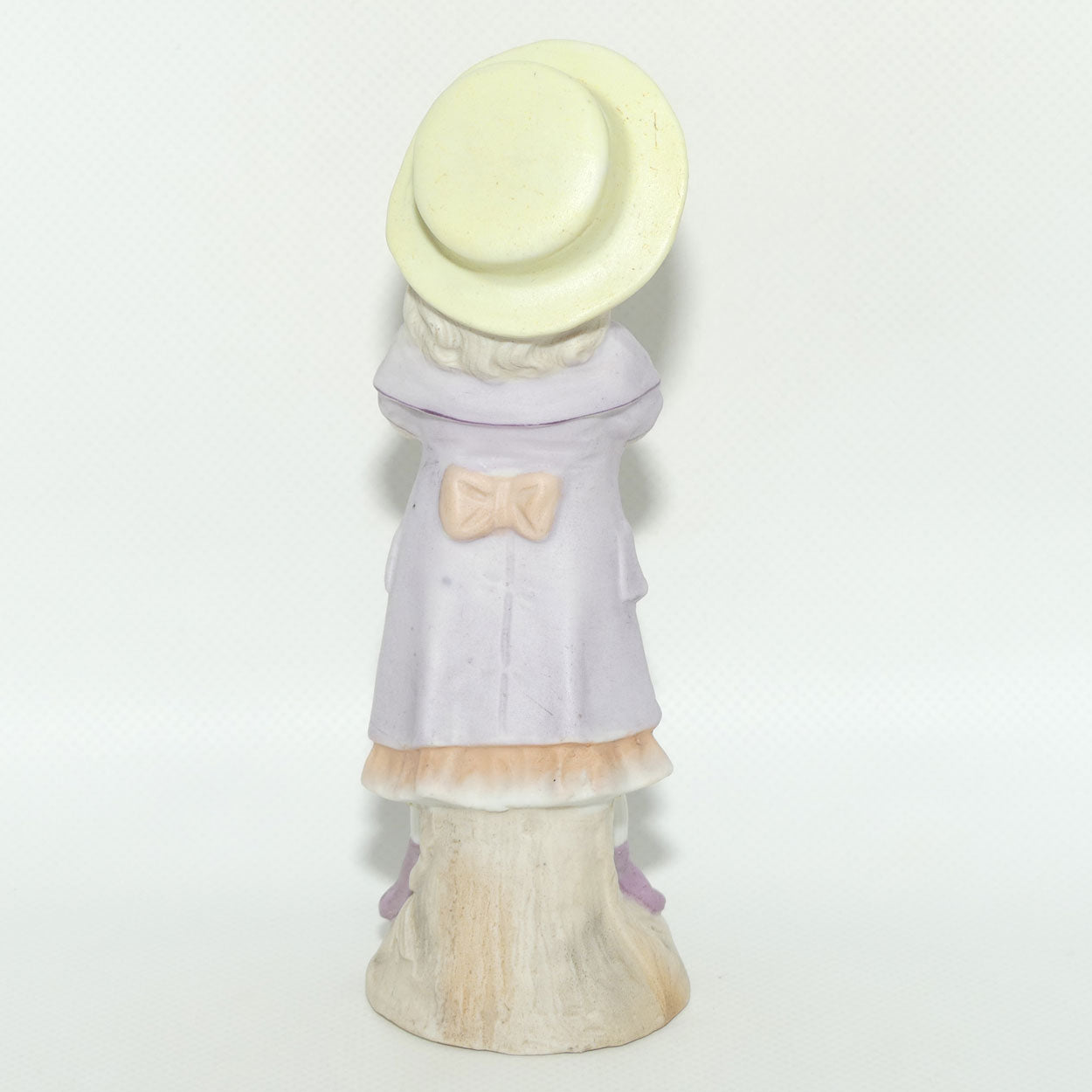 Victorian era Bisque figure of a Girl in Yellow Bonnet