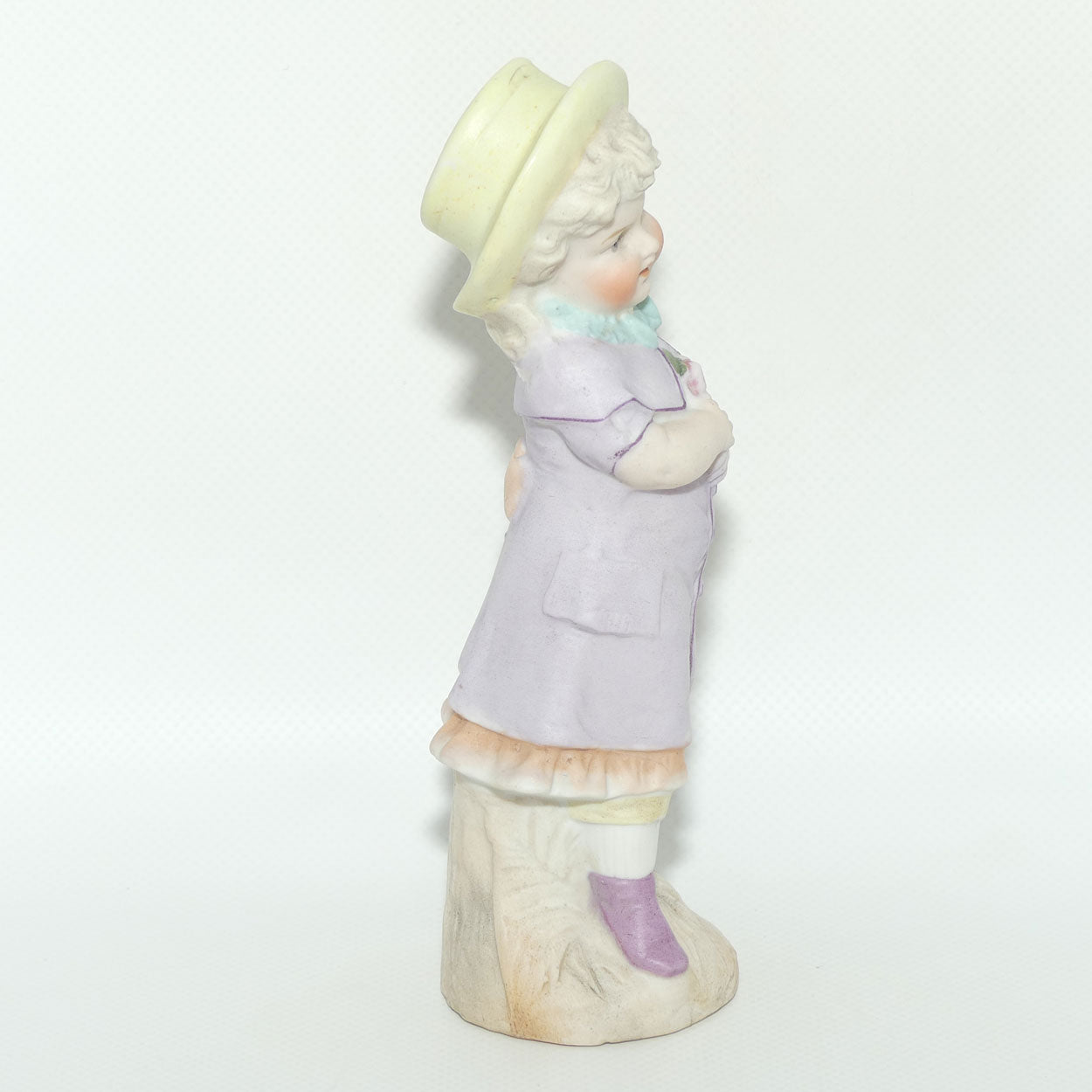Victorian era Bisque figure of a Girl in Yellow Bonnet