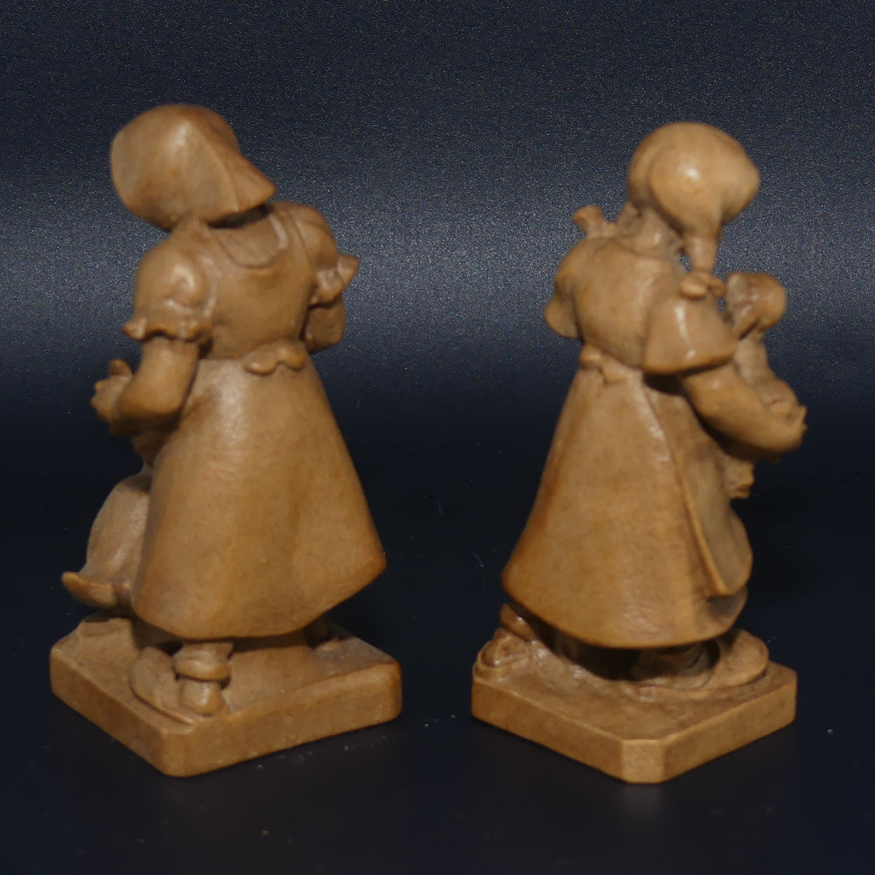 Pair of Wooden finely carved figures of Farm girls | Swiss | by Walter Stahli