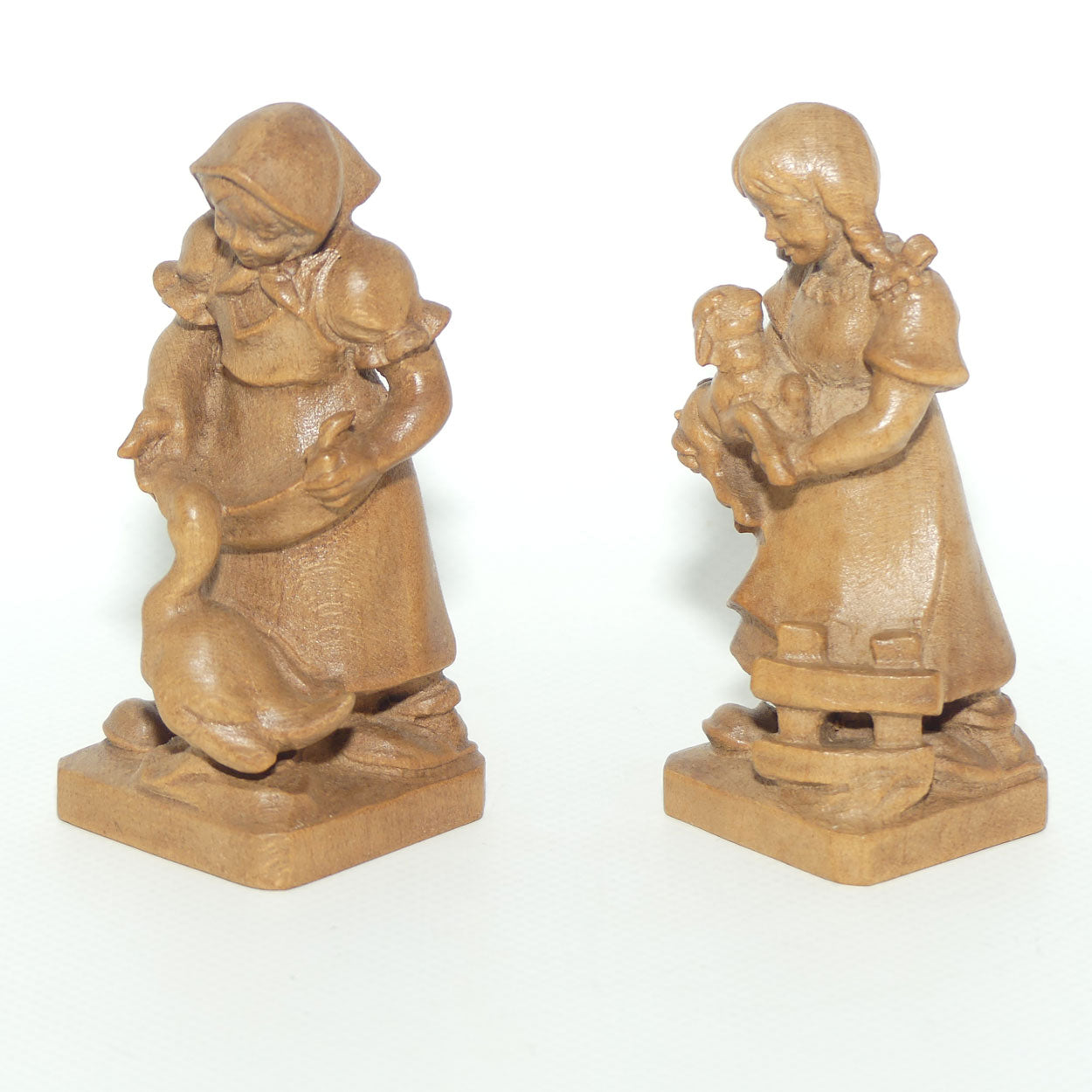 Pair of Wooden finely carved figures of Farm girls | Swiss | by Walter Stahli