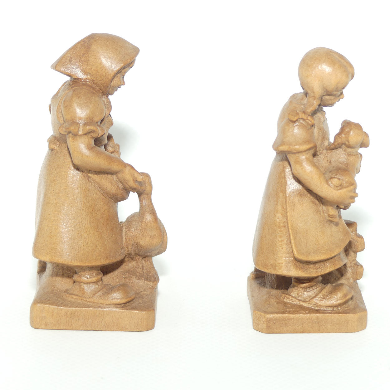 Pair of Wooden finely carved figures of Farm girls | Swiss | by Walter Stahli