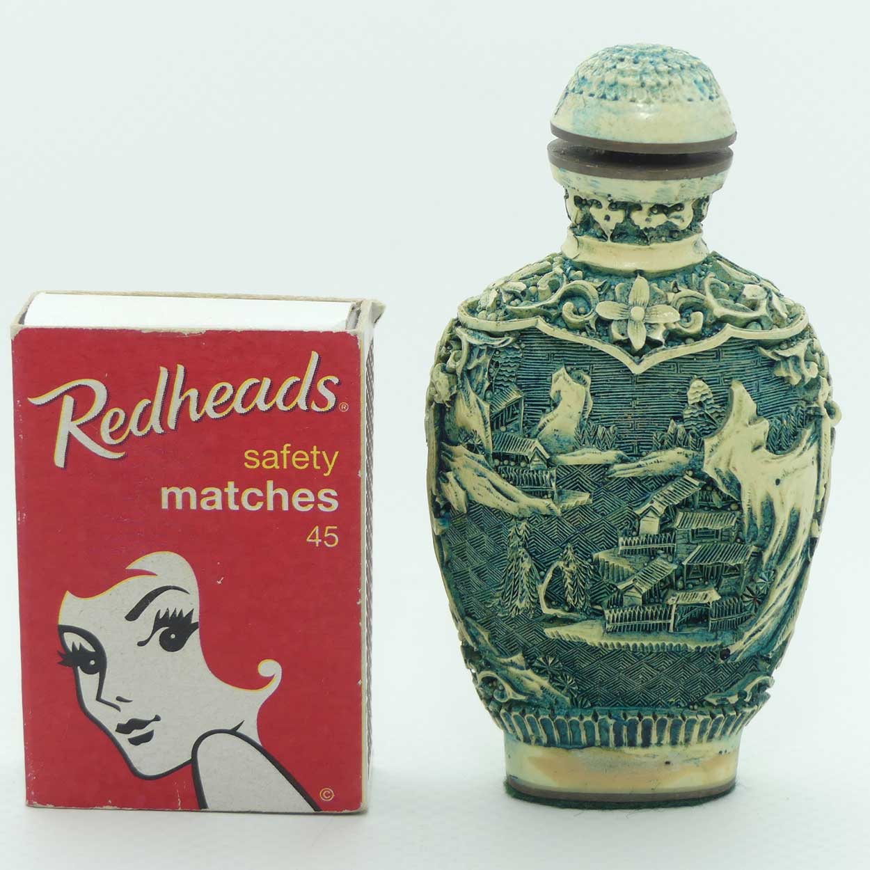 Chinese snuff bottle with stopper | White Cinnabar with Green tint | Oval