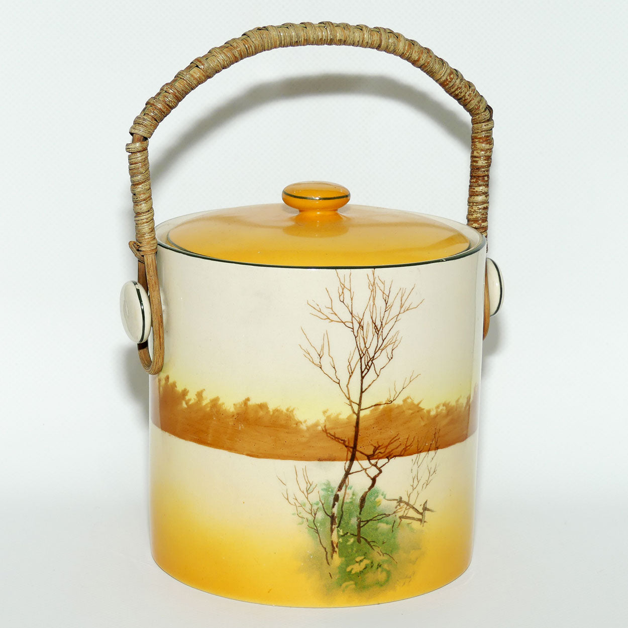 Royal Doulton Coaching Days biscuit barrel with wicker handle