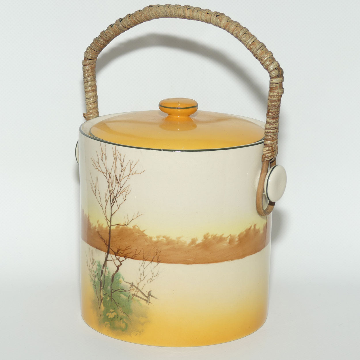 Royal Doulton Coaching Days biscuit barrel with wicker handle