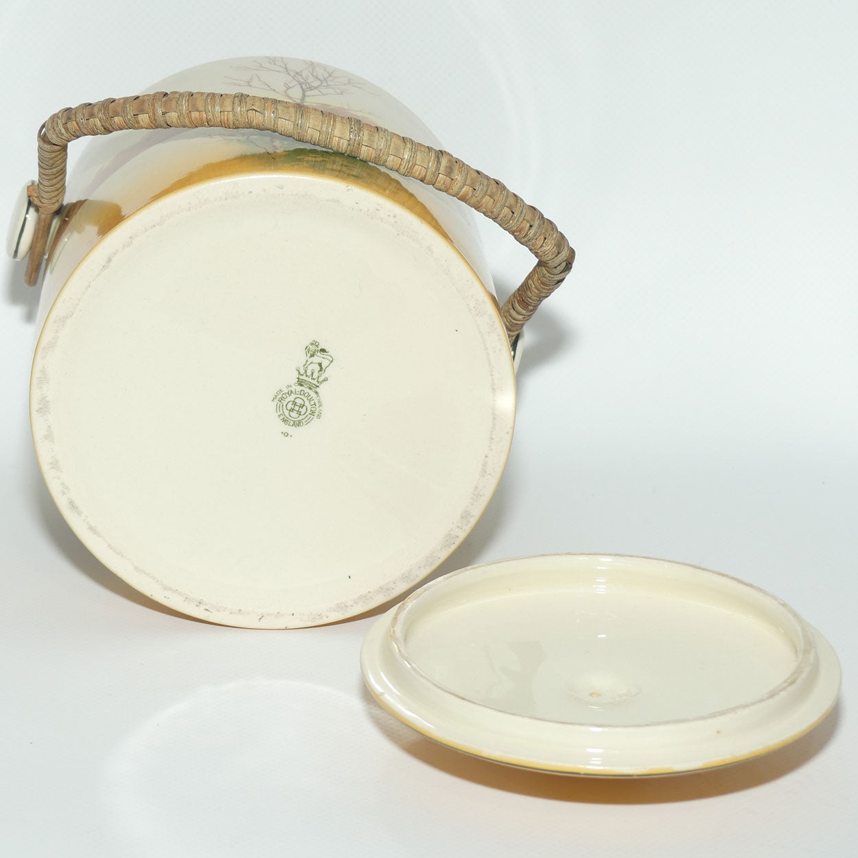 Royal Doulton Coaching Days biscuit barrel with wicker handle