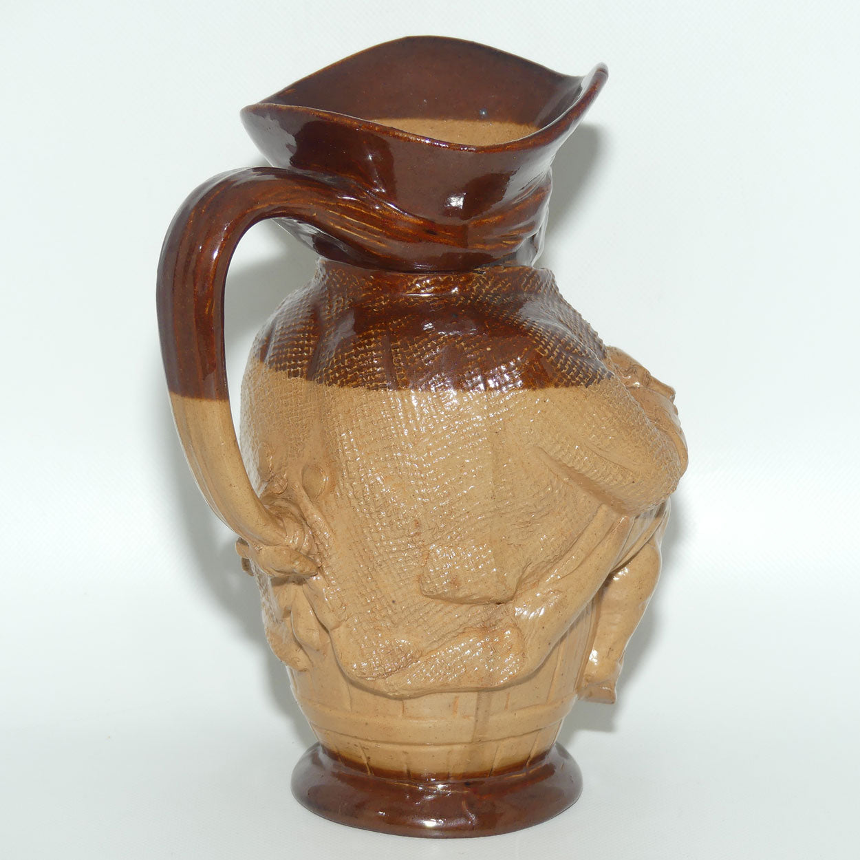 X6365 Doulton Lambeth Toby XX toby jug | Hand holds jug of Ale