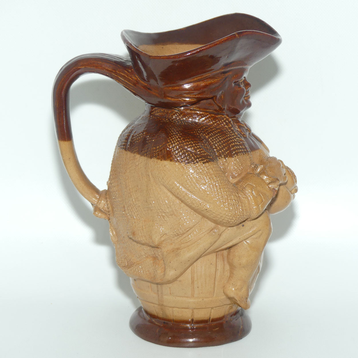 X6365 Doulton Lambeth Toby XX toby jug | Hand holds jug of Ale