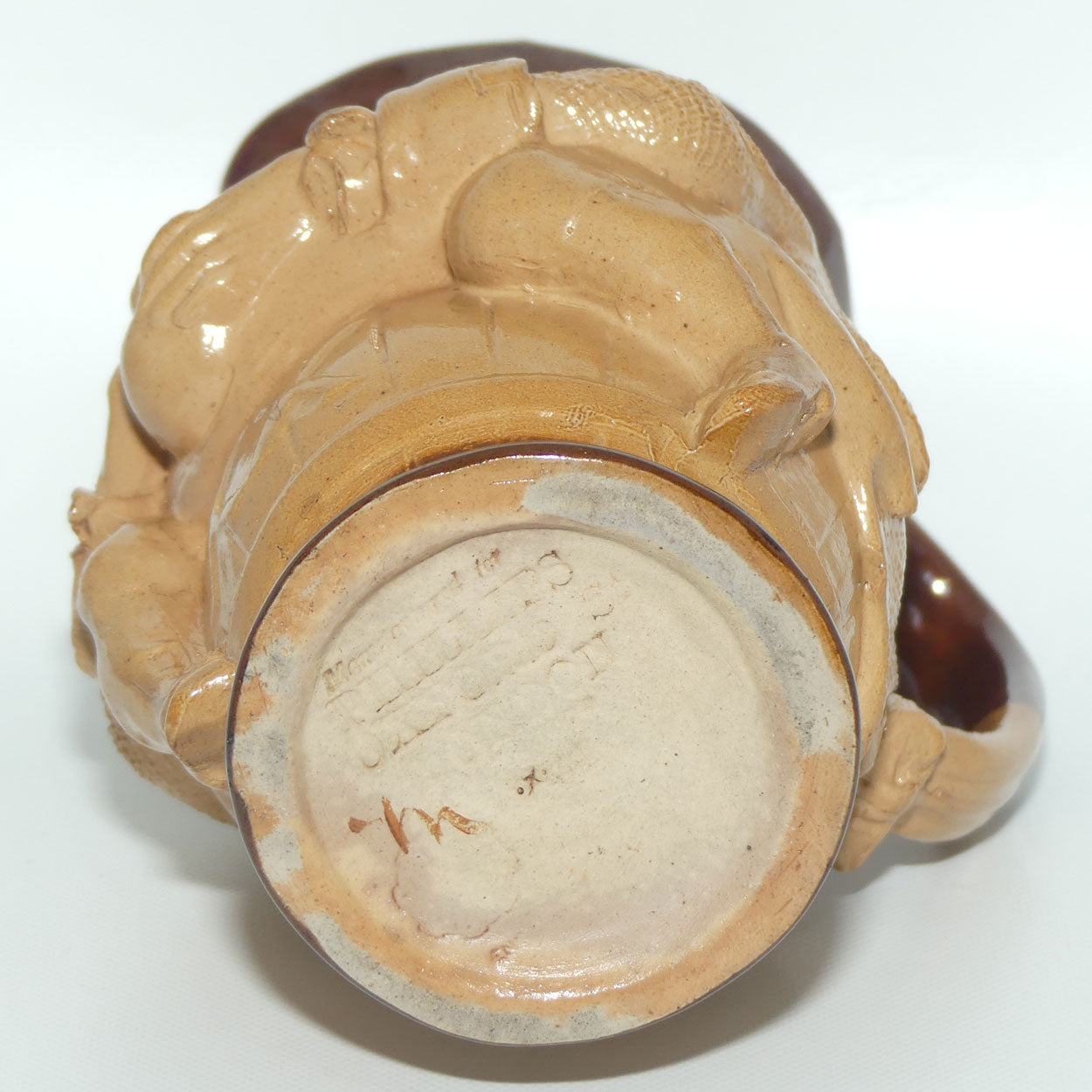 X6365 Doulton Lambeth Toby XX toby jug | Hand holds jug of Ale