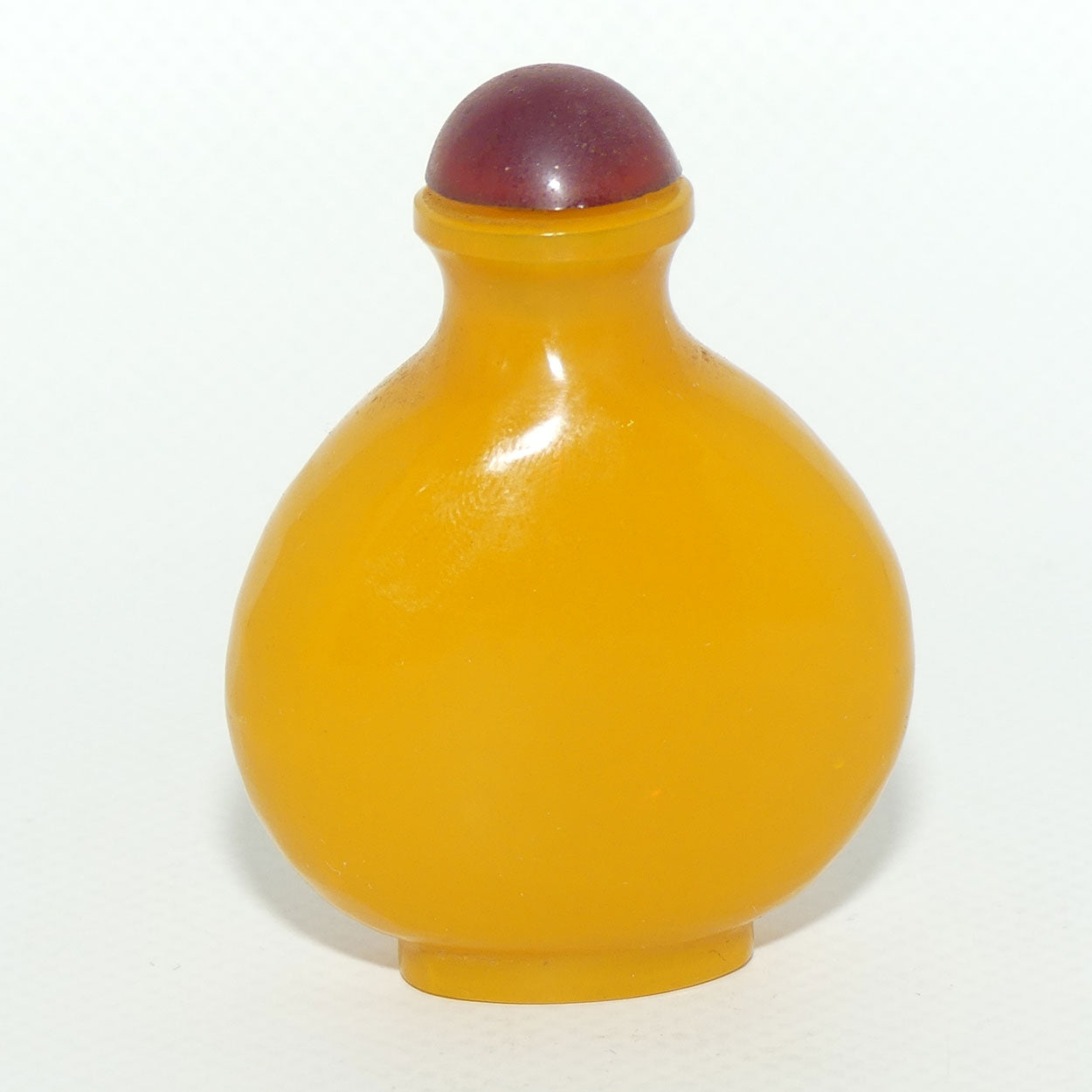 Chinese Snuff bottle | Butterscotch Glass with Red Stopper