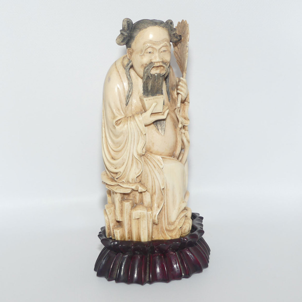 Exceptional Carved Ivory figure on Rosewood base depicting Immortal Zhongli Quan