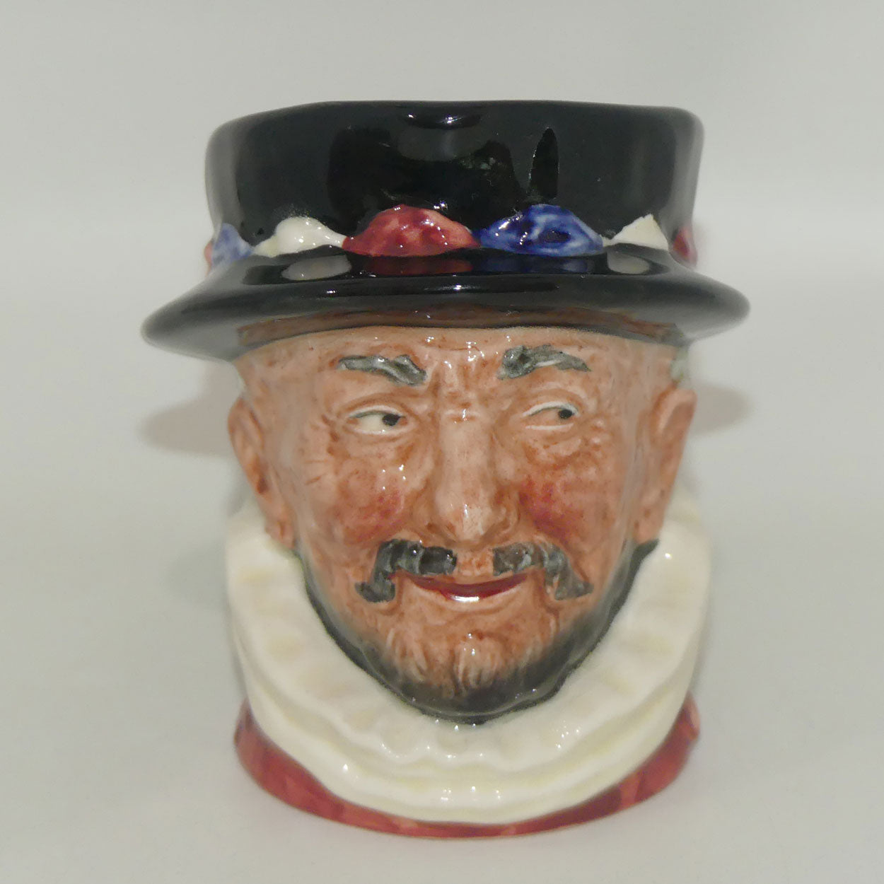 d6233-royal-doulton-small-character-jug-beefeater-beefeaters-stamp-er-handle-pink