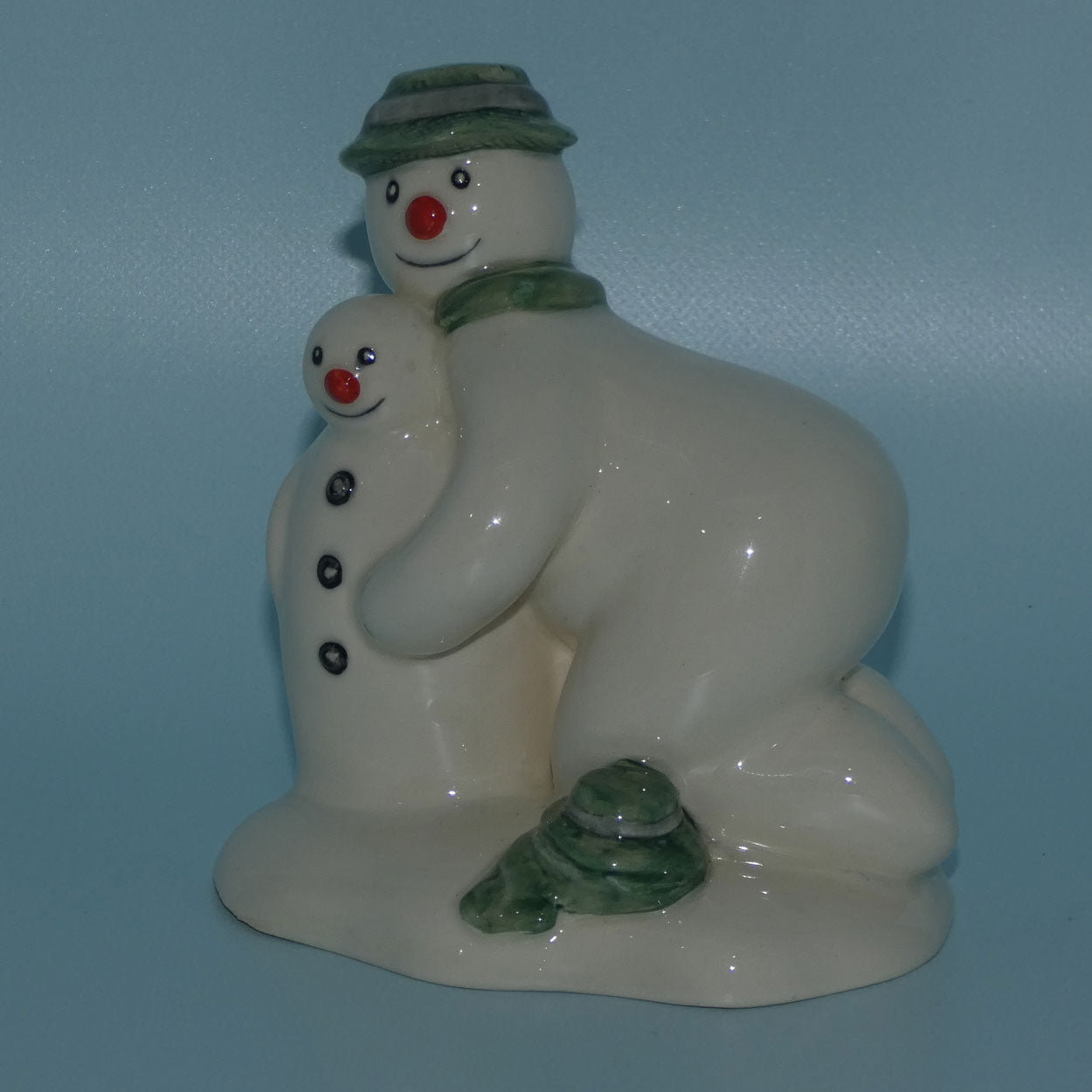 ds23-royal-doulton-snowman-figure-building-the-snowman