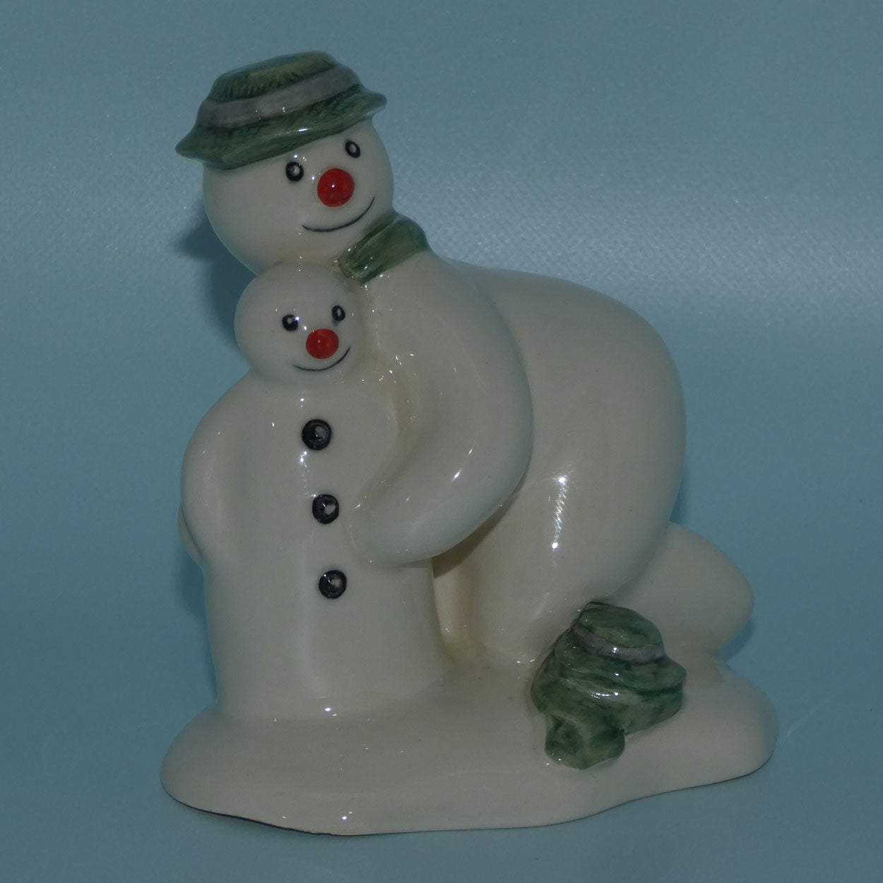ds23-royal-doulton-snowman-figure-building-the-snowman