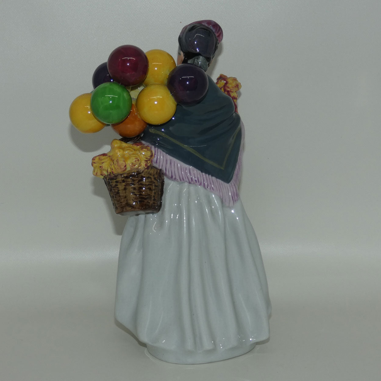 HN1843 Royal Doulton figure Biddy Penny Farthing | later stamp